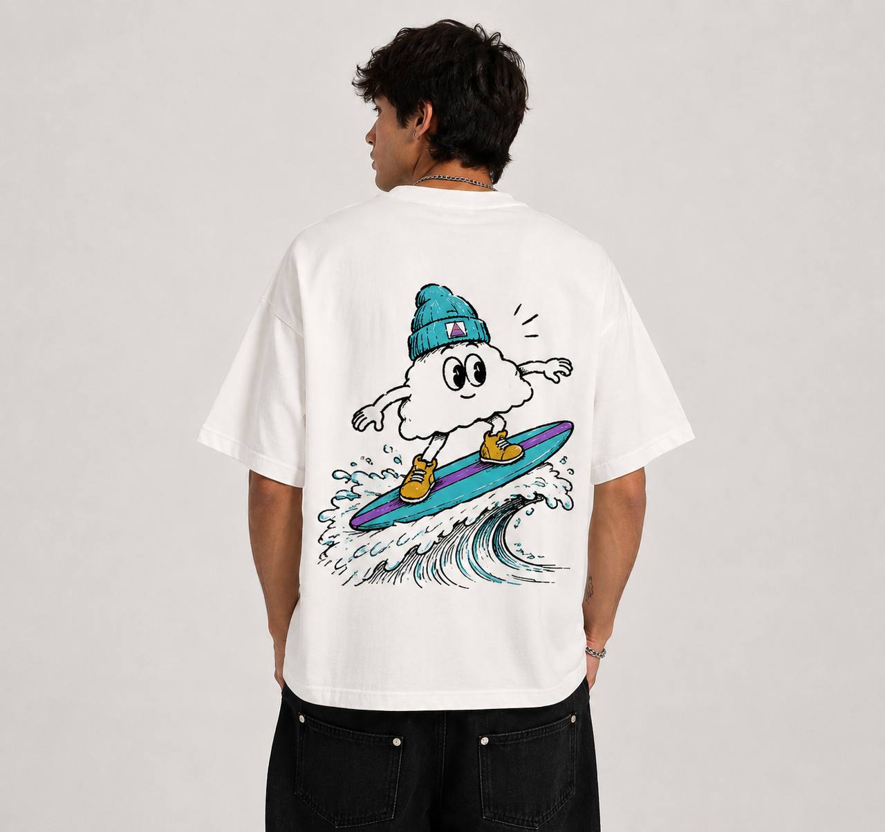 Rocky surfing graphic on back of white T-shirt